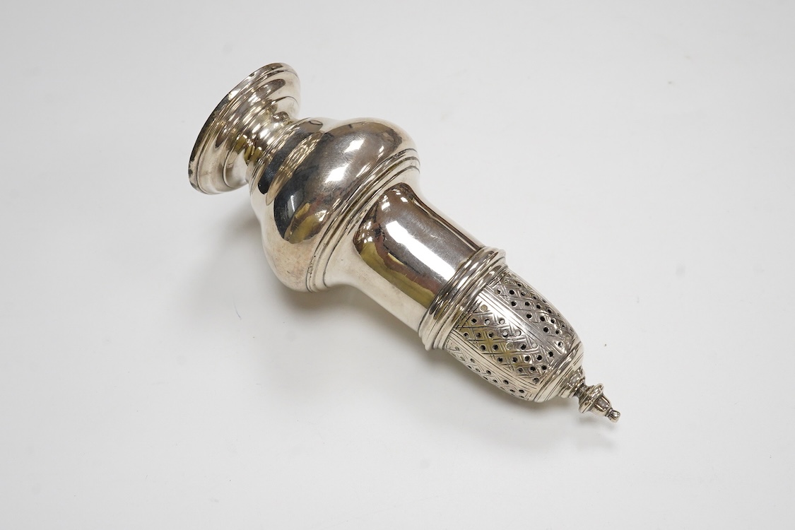 A George II silver baluster pepperette, maker probably Samuel Wood, London, 1750, height 11.7cm, 84 grams.